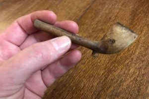 Clay Pipe Found In Roof Of Historic House Used To Ward Off Evil